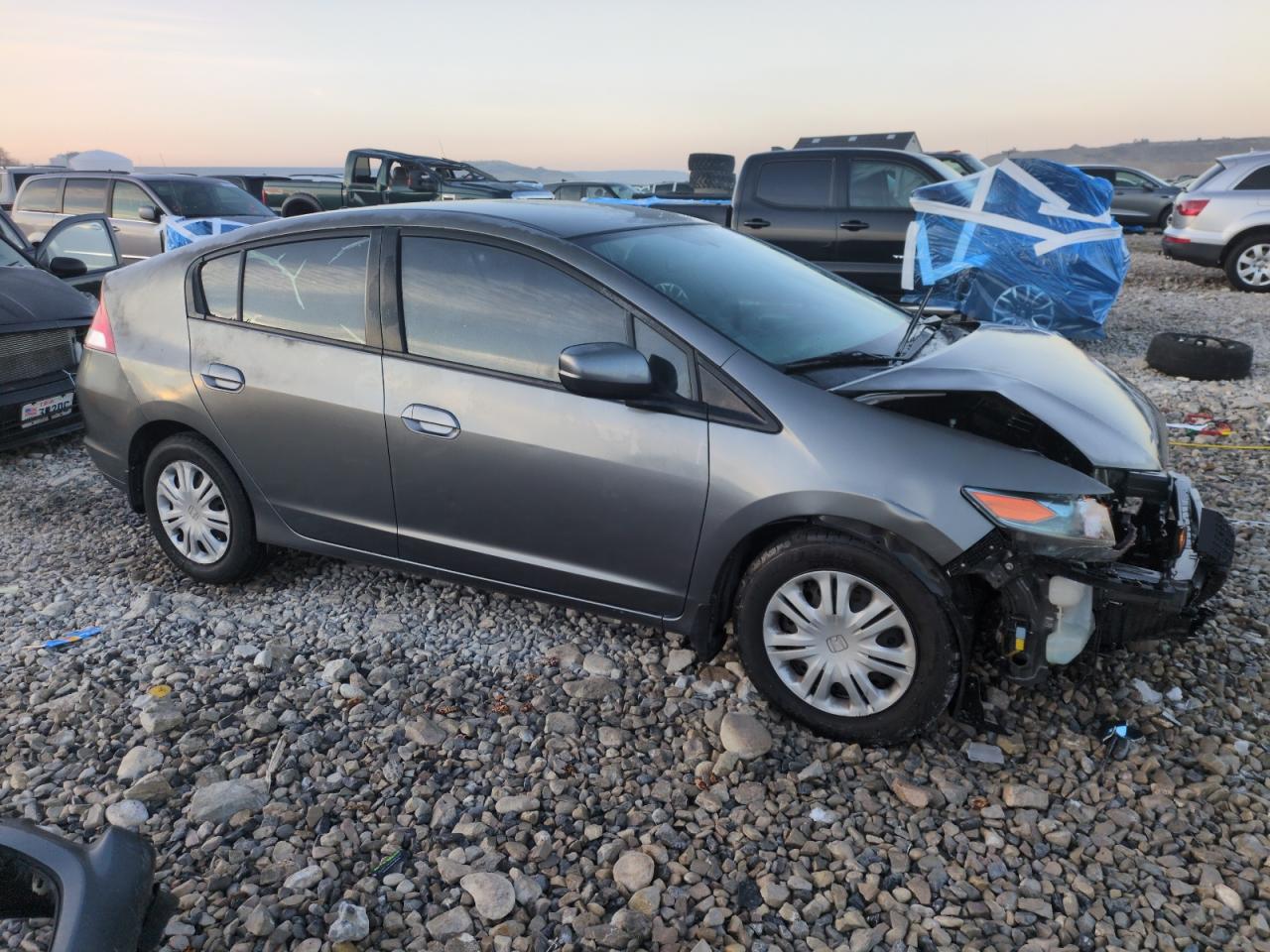 2010 Honda Insight VIN JHMZE2H51AS036238 Copart auction photo, front end damage thumbnail 4