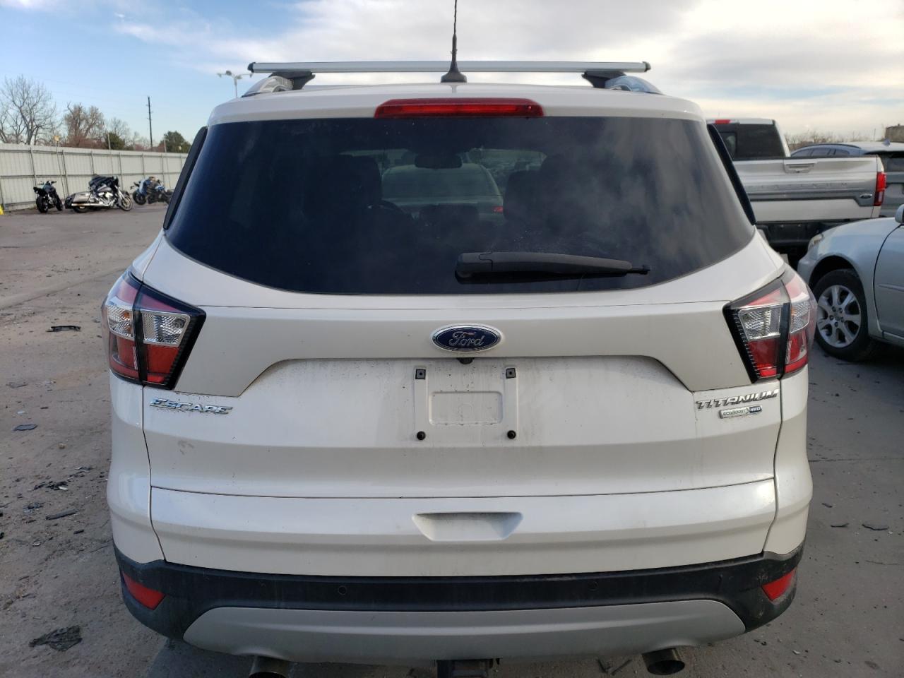 2018 Ford Escape VIN 1FMCU9J95JUC70494 Copart auction photo, front end / hail damage thumbnail 6