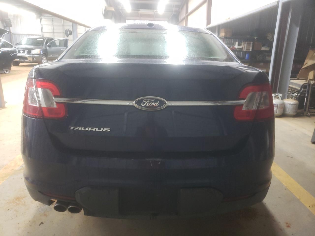 2012 Ford Taurus VIN 1FAHP2DW6CG108181 Copart auction photo, front end / side damage thumbnail 6