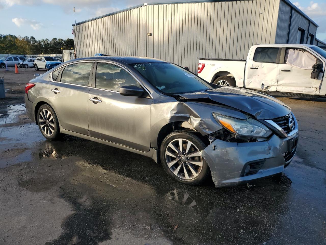 2017 Nissan Altima VIN 1N4AL3AP5HC272617 Copart auction photo, side damage thumbnail 4
