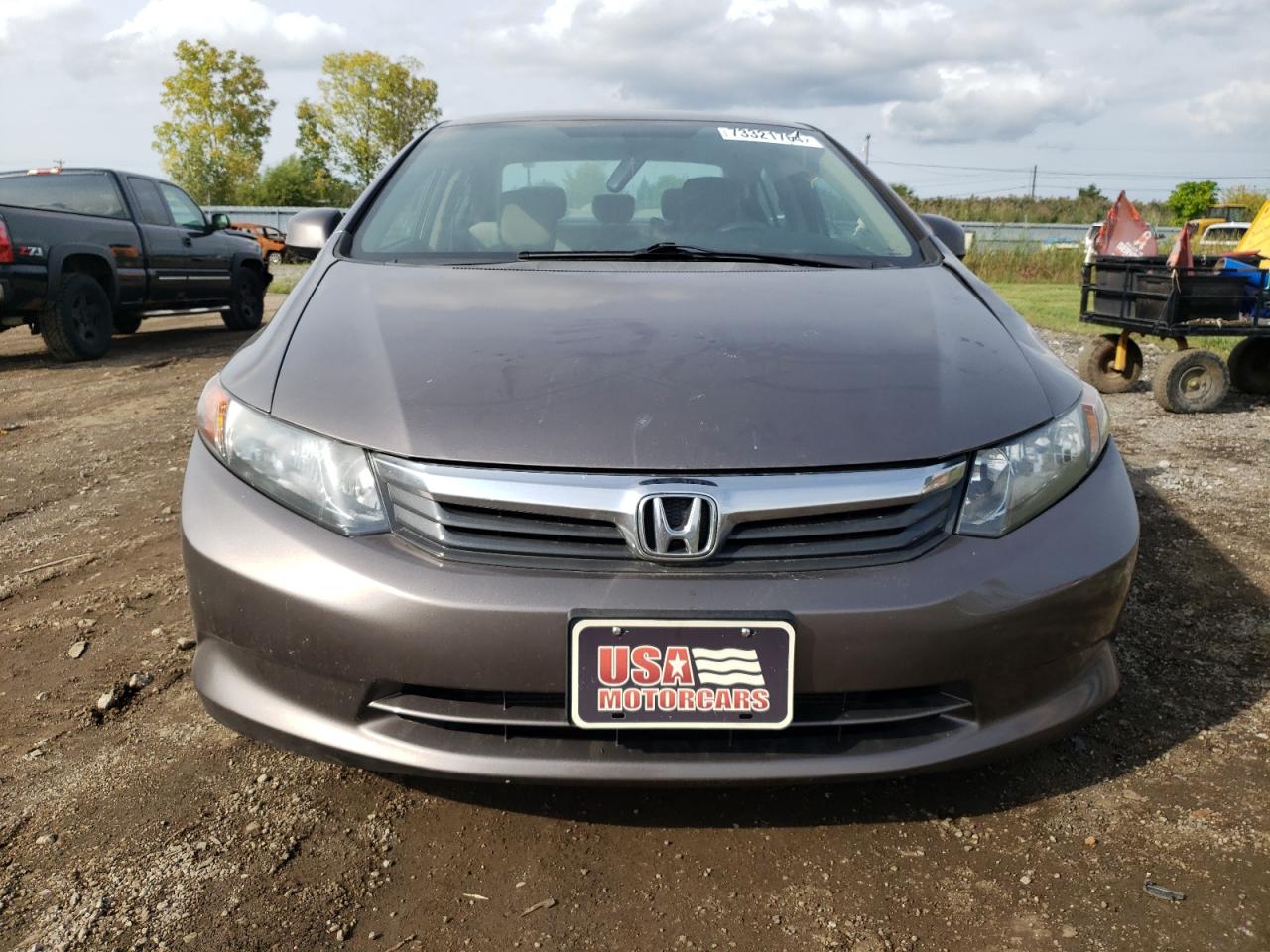 2012 Honda Civic VIN 2HGFB2F53CH589582 Copart auction photo, front end / side damage thumbnail 5