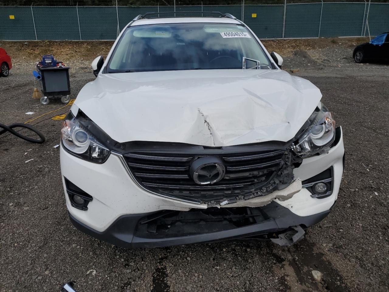 2016 Mazda CX-5 VIN JM3KE4CY5G0908092 Copart auction photo, front end damage thumbnail 5