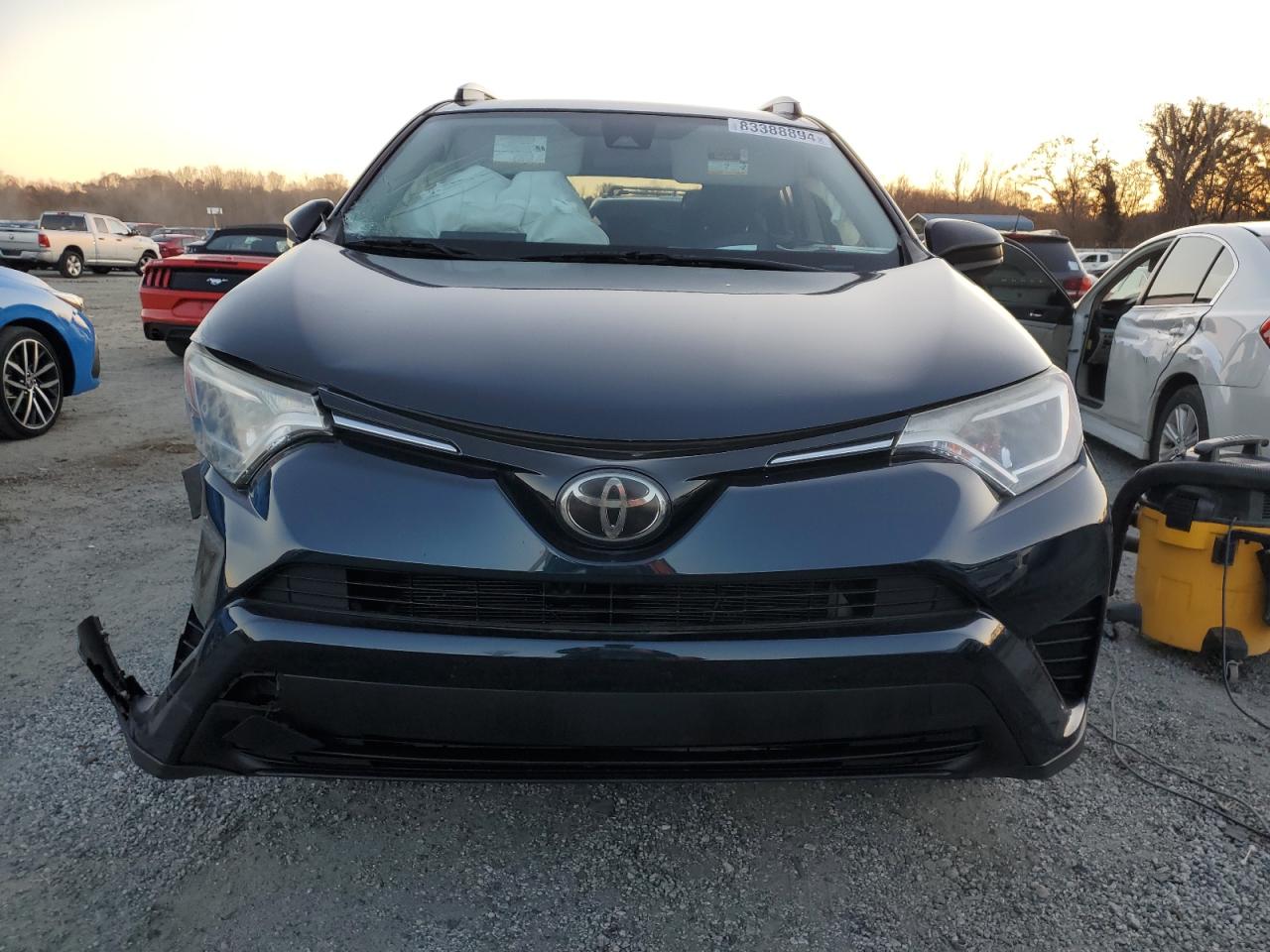 2017 Toyota RAV 4 VIN JTMZFREV2HJ122735 Copart auction photo, front end / side damage thumbnail 5