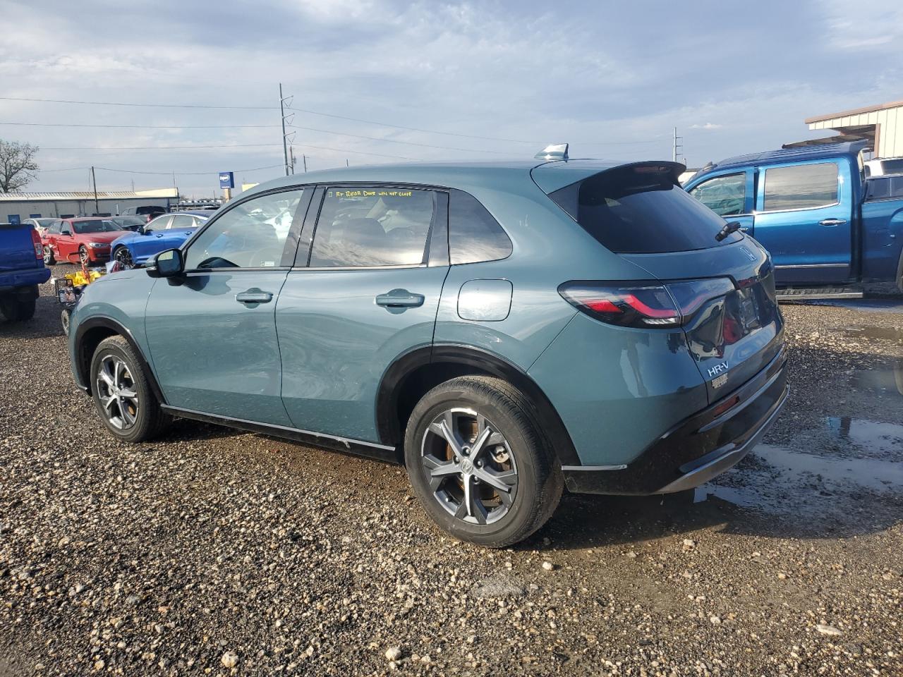 2023 Honda HR-V VIN 3CZRZ1H79PM736750 Copart auction photo, side damage thumbnail 2