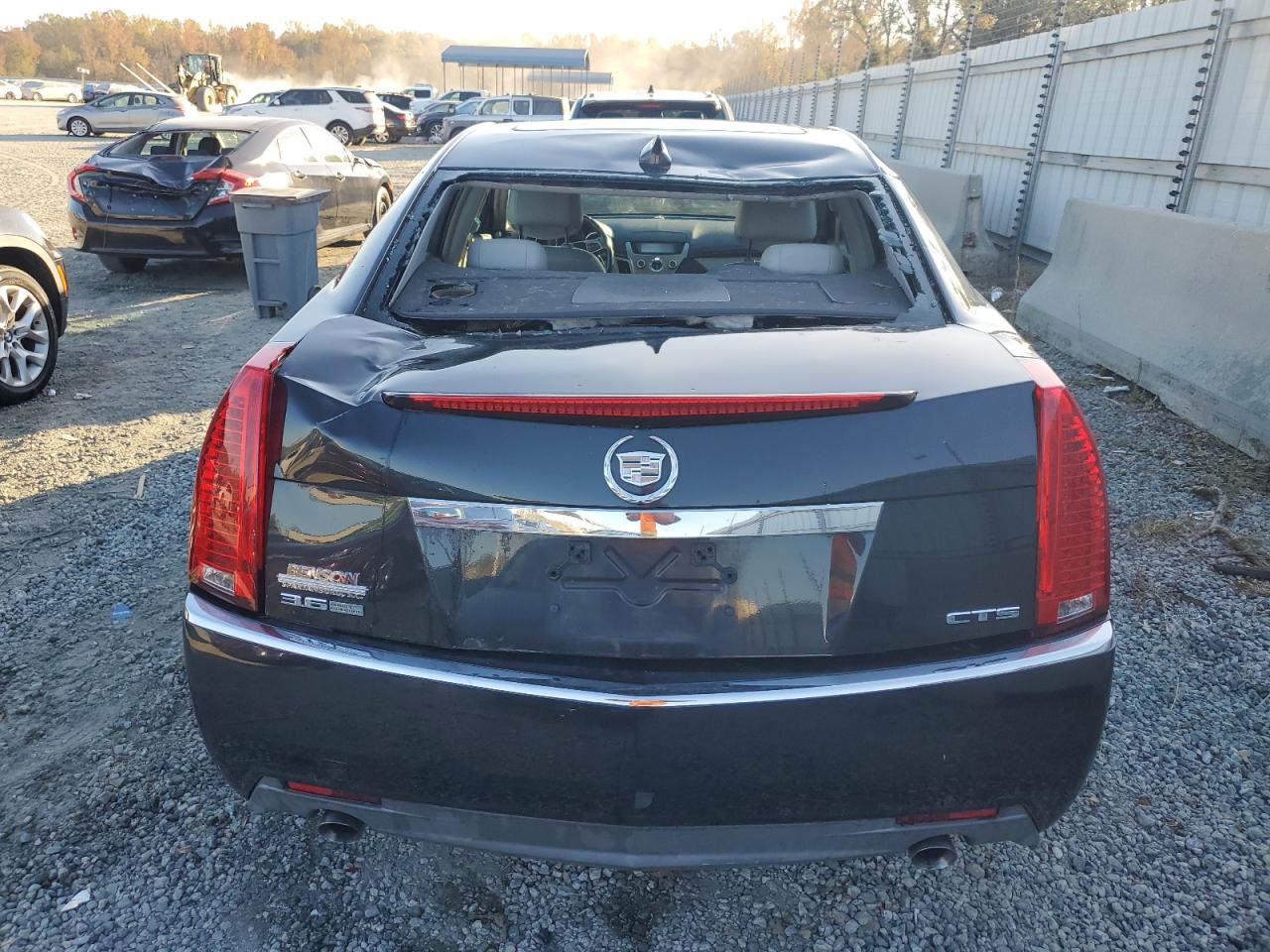 2009 Cadillac CTS VIN 1G6DU57VX90133305 Copart auction photo, top/roof damage thumbnail 6