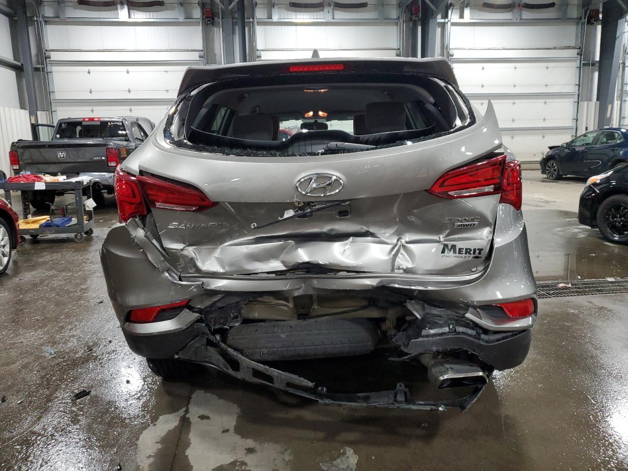 2017 Hyundai Santa Fe VIN 5NMZTDLB4HH003921 Copart auction photo, rear end damage thumbnail 6