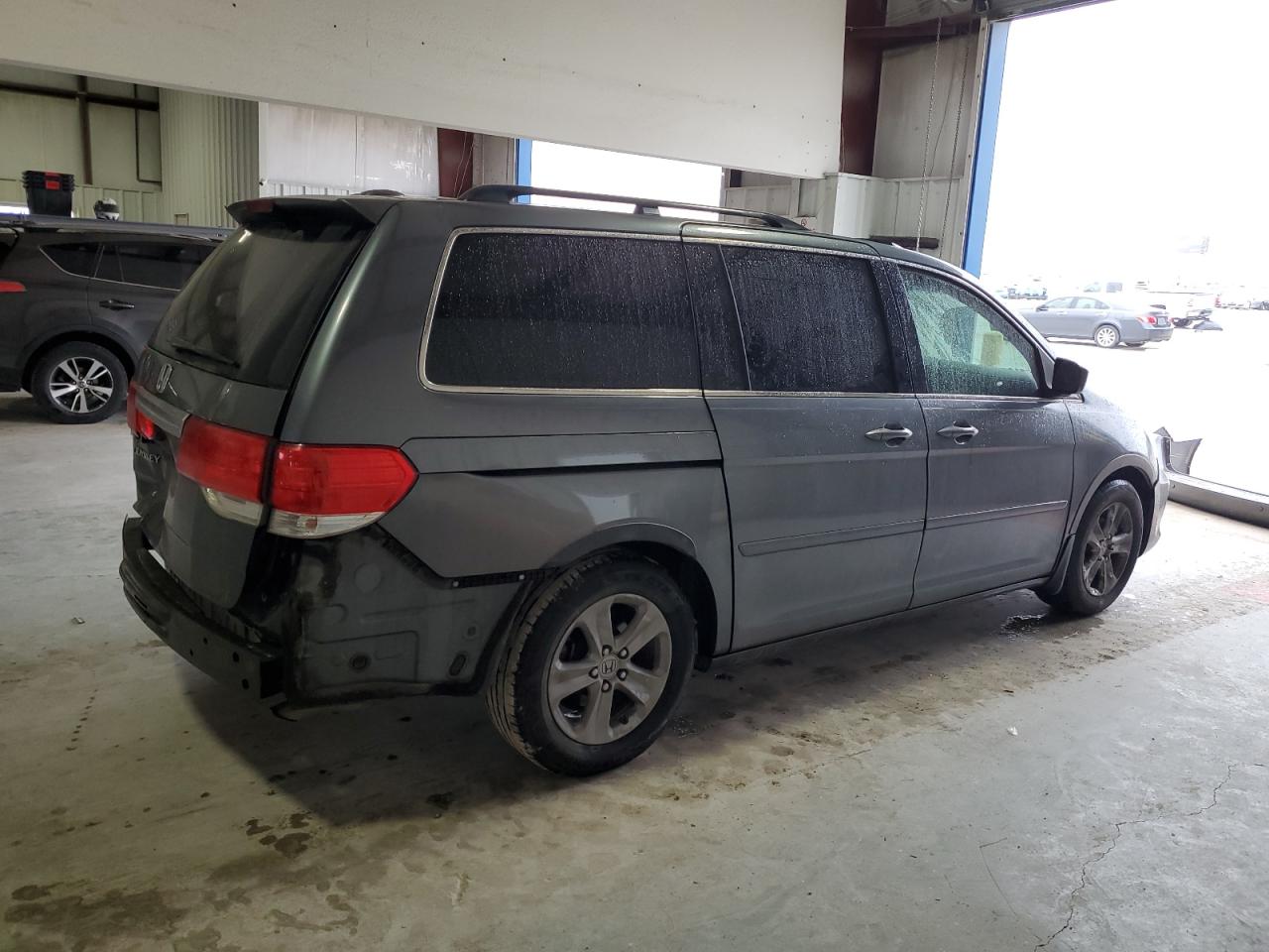 2010 Honda Odyssey VIN 5FNRL3H9XAB084091 Copart auction photo, rear end / front end damage thumbnail 3