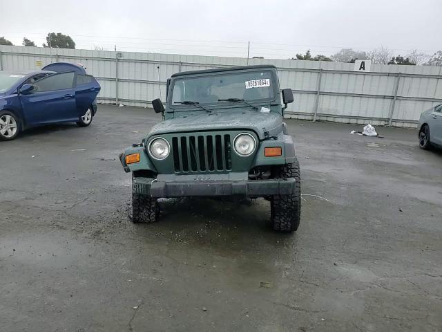 1999 Jeep Wrangler VIN 1J4FY19S7XP487349 Copart auction photo, all over damage thumbnail 10