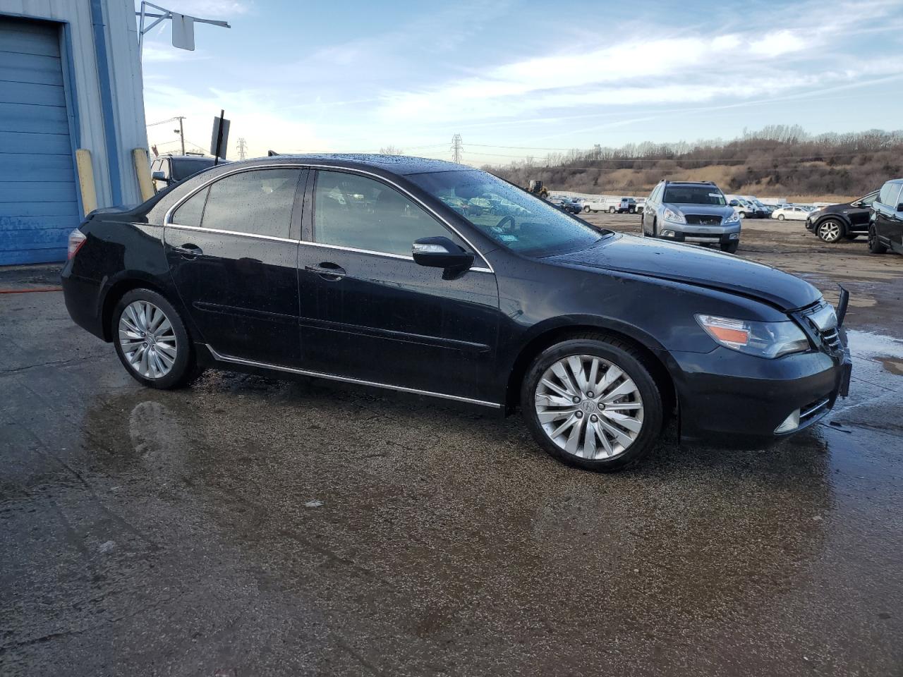 2011 Acura RL VIN JH4KB2F68BC000497 Copart auction photo, front end / side damage thumbnail 4
