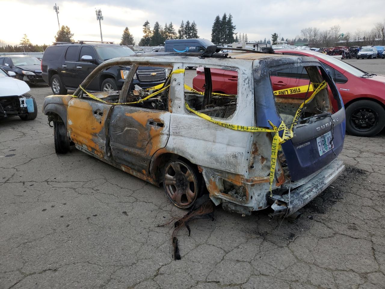 2003 Subaru Forester VIN JF1SG63683G766793 Copart auction photo, burn damage thumbnail 2