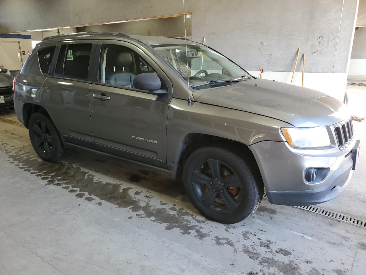 2012 Jeep Compass VIN 1C4NJDEB4CD689929 Copart auction photo, normal wear damage thumbnail 4