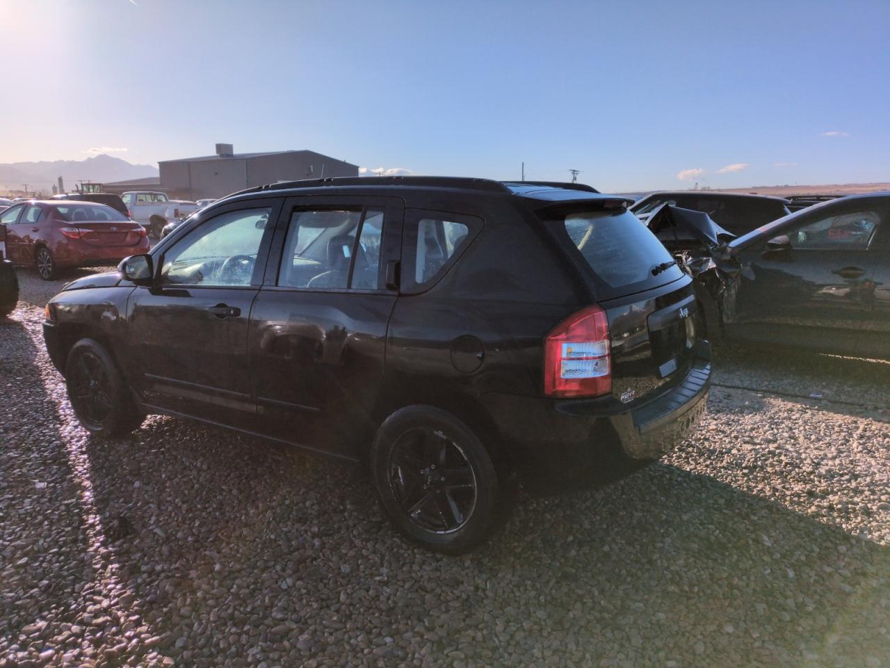 2009 Jeep Compass VIN 1J4FT47B89D189562 Copart auction photo, side damage thumbnail 2
