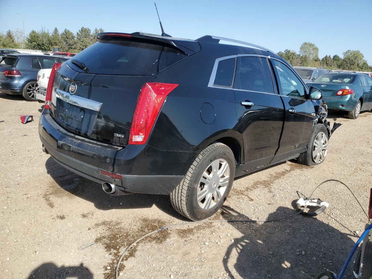 2012 Cadillac SRX VIN 3GYFNAE31CS560914 Copart auction photo, front end damage thumbnail 3
