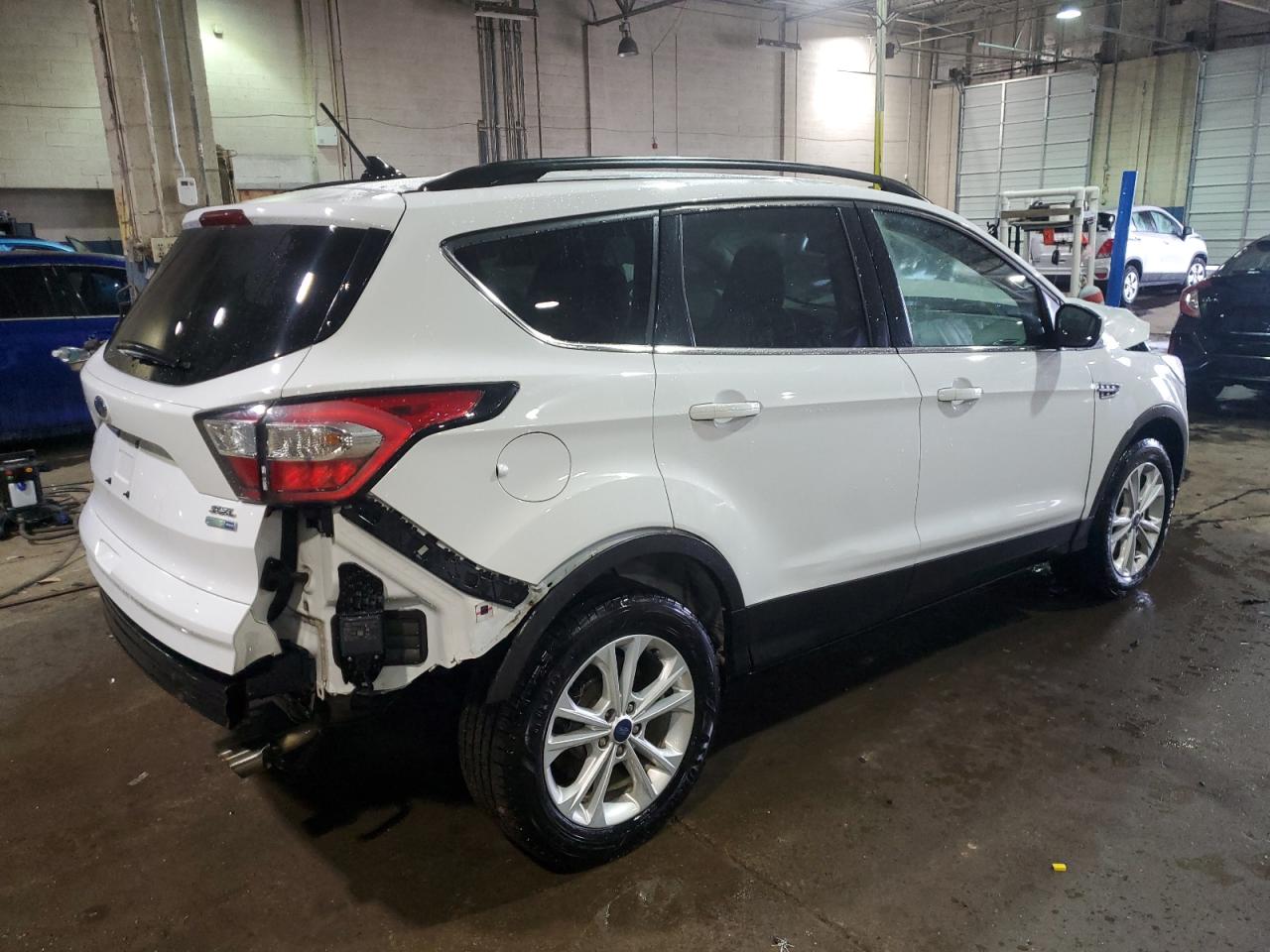 2018 Ford Escape VIN 1FMCU9HD3JUB23245 Copart auction photo, front end / rear end damage thumbnail 3