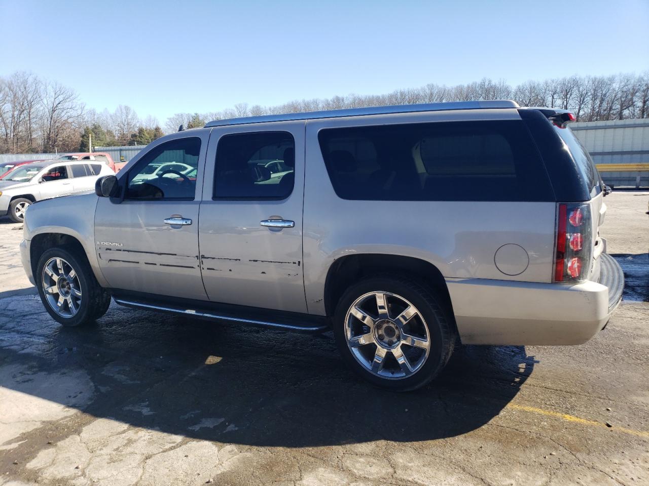 2007 GMC Yukon VIN 1GKFK66877J310496 Copart auction photo, rear end / hail damage thumbnail 2
