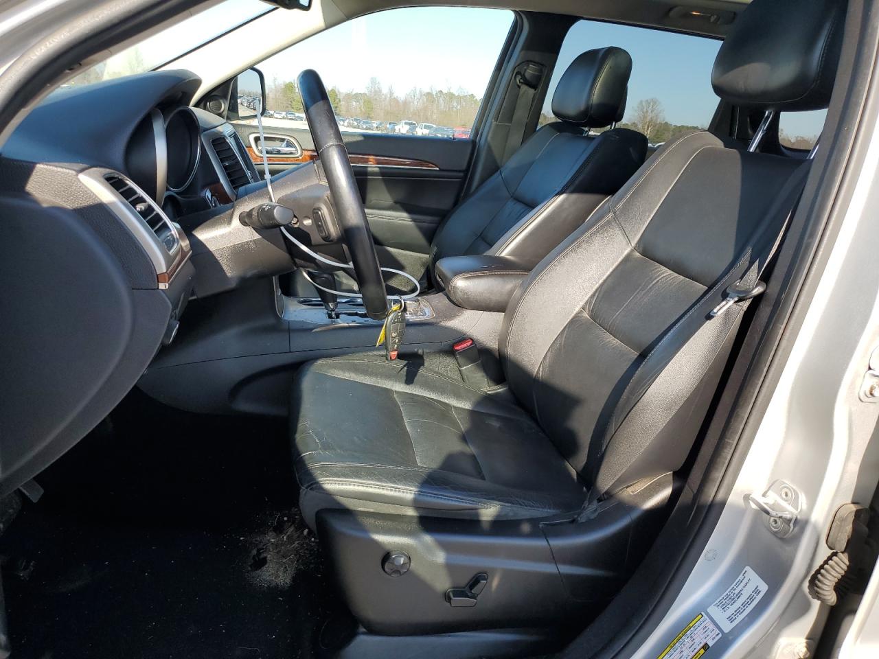 2012 Jeep Grand Cherokee VIN 1C4RJFBT4CC277090 Copart auction photo, front end damage thumbnail 7