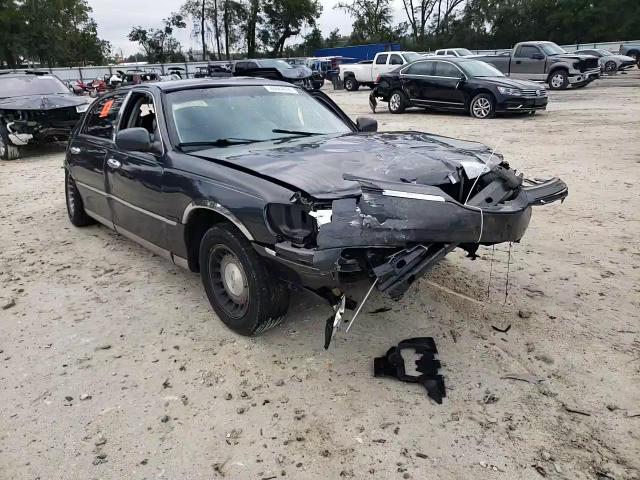 2002 Lincoln Town Car VIN 1LNHM81WX2Y645781 Copart auction photo, all over damage thumbnail 11