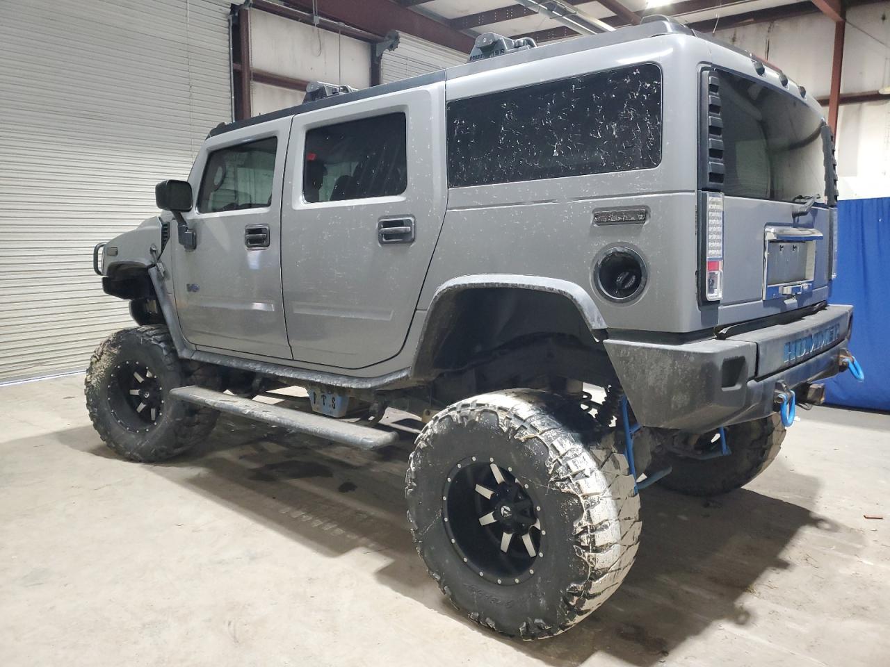 2003 Hummer H2 VIN 5GRGN23UX3H121083 Copart auction photo, minor dent/scratches damage thumbnail 2