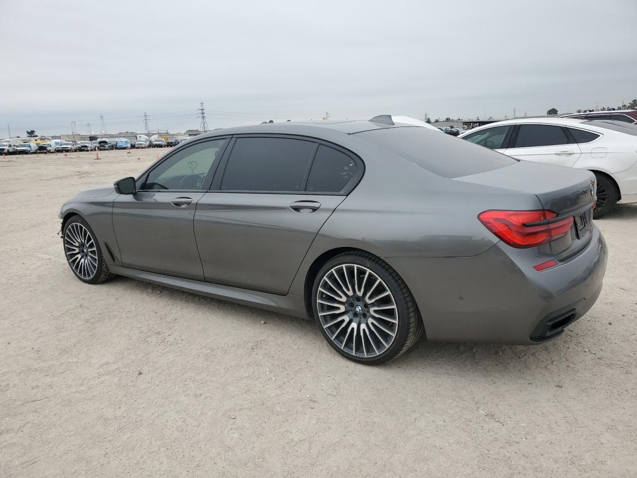2018 BMW 7er VIN WBA7F0C59JGM24142 Copart auction photo, front end / minor dent/scratches damage thumbnail 2