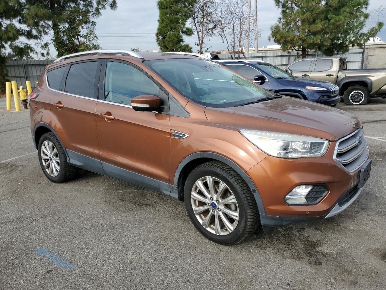 2017 Ford Escape VIN 1FMCU0JD3HUA28121 Copart auction photo, rear end damage thumbnail 4