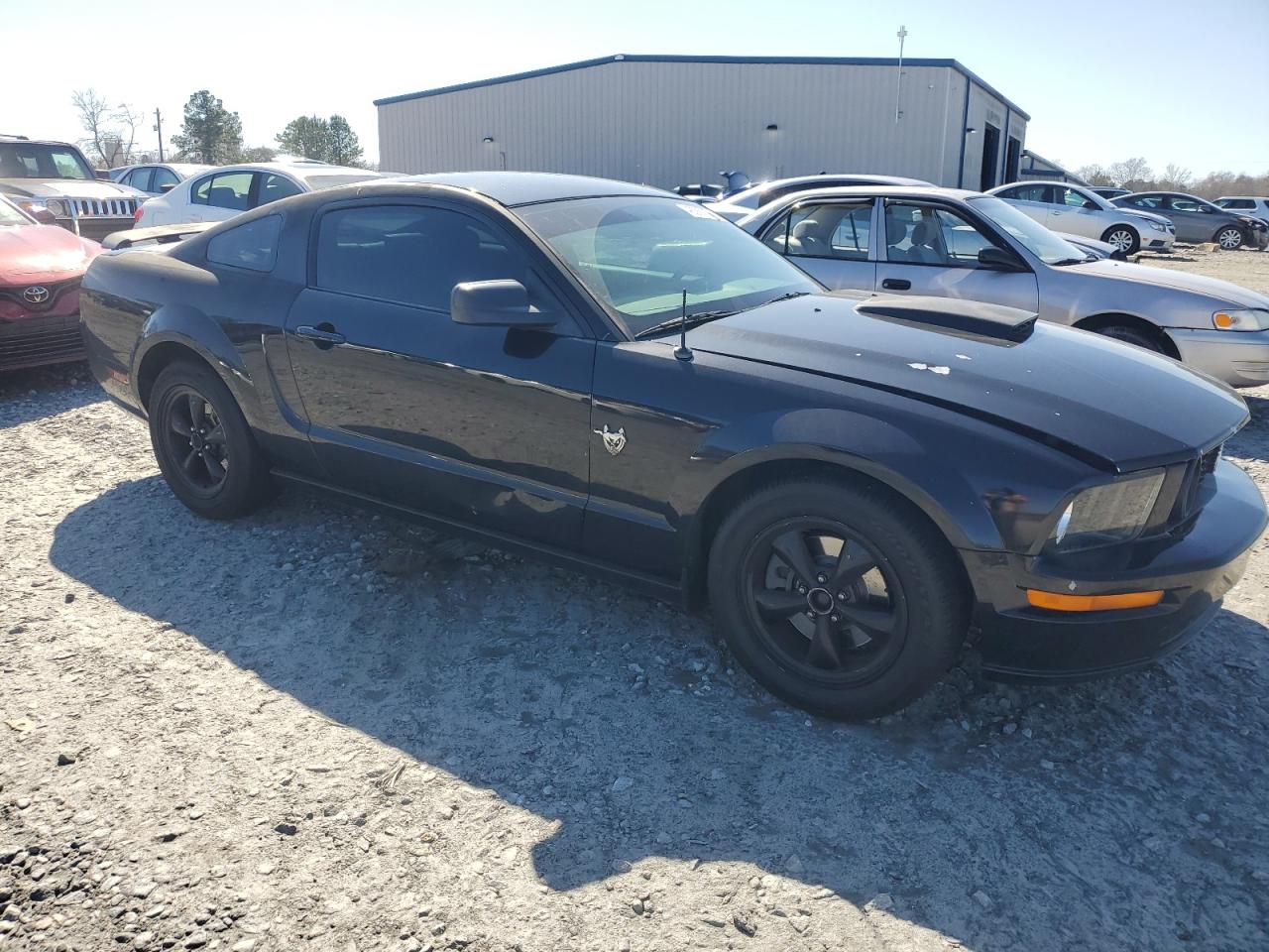 2009 Ford Mustang VIN 1ZVHT82HX95123166 Copart auction photo, rear end / side damage thumbnail 4