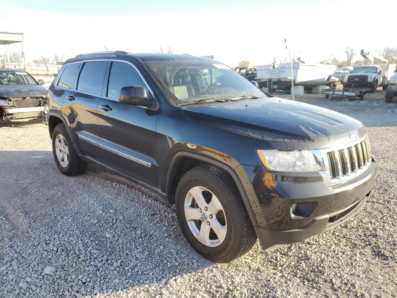 2011 Jeep Grand Cherokee VIN 1J4RR4GG1BC615711 Copart auction photo, side damage thumbnail 4