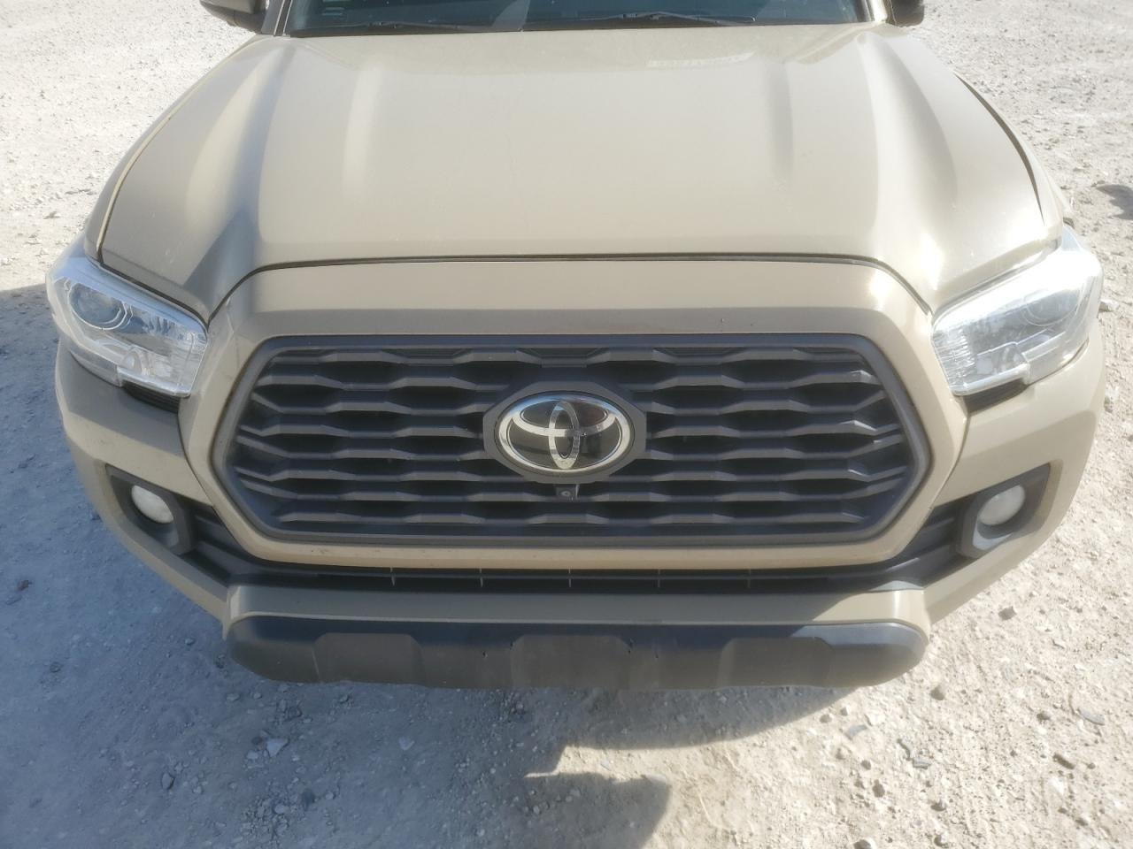 2020 Toyota Tacoma VIN 3TMDZ5BN7LM084784 Copart auction photo, side / front end damage thumbnail 12