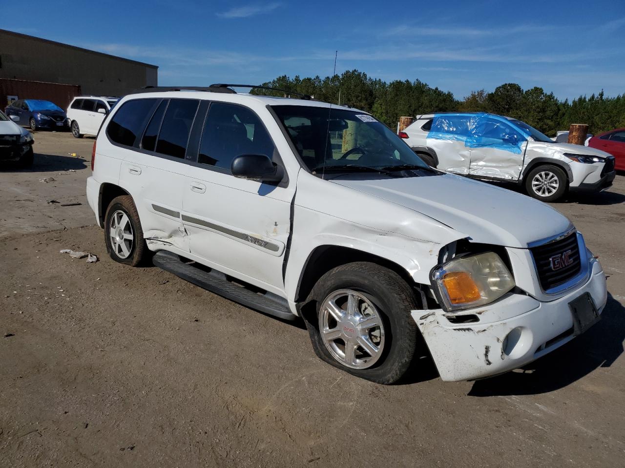 2004 GMC Envoy VIN 1GKDT13S042106538 Copart auction photo, side / front end damage thumbnail 4