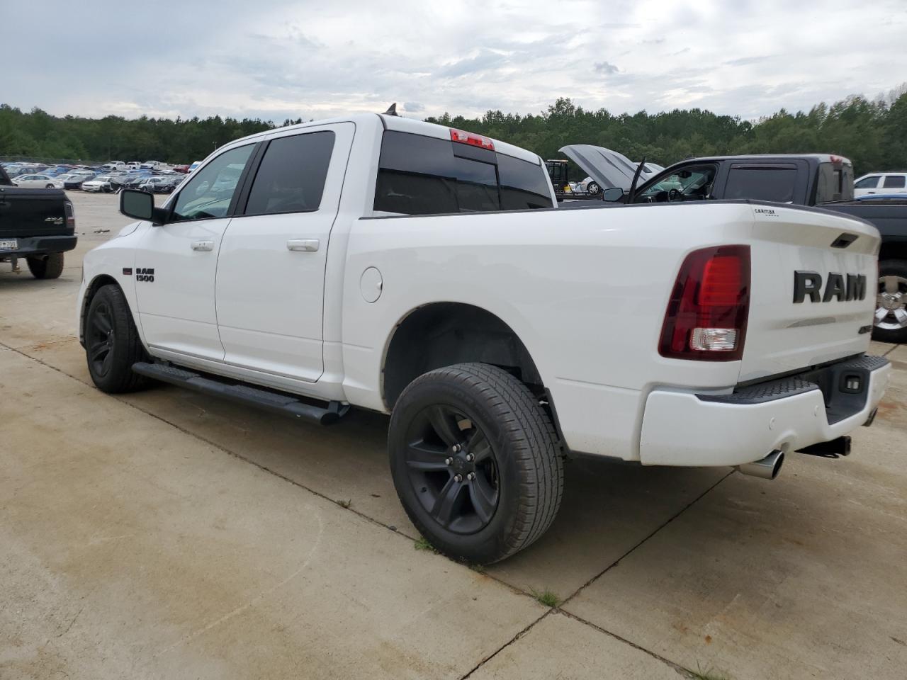 2018 RAM 1500 VIN 1C6RR7MT6JS209850 Copart auction photo, front end / side damage thumbnail 2