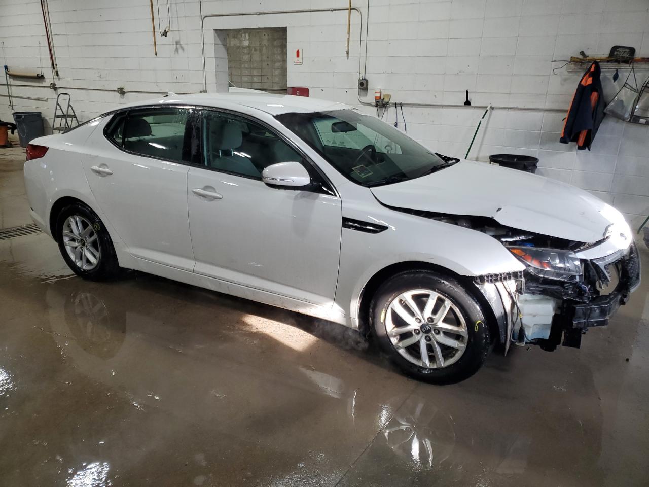 2011 KIA Optima VIN KNAGM4A72B5057261 Copart auction photo, front end / hail damage thumbnail 4