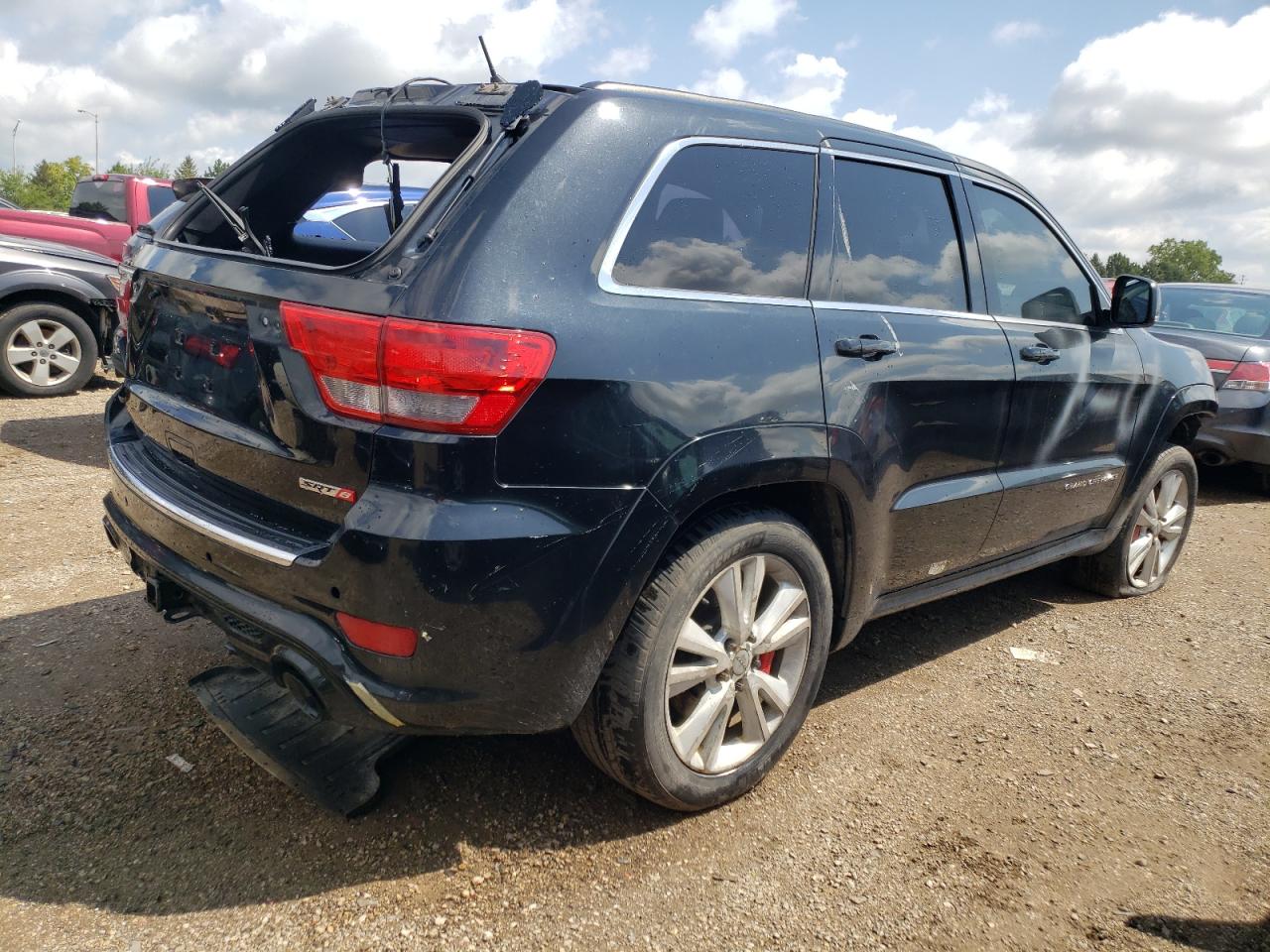 2012 Jeep Grand Cherokee VIN 1C4RJFDJ9CC328739 Copart auction photo, front end / rear end damage thumbnail 3