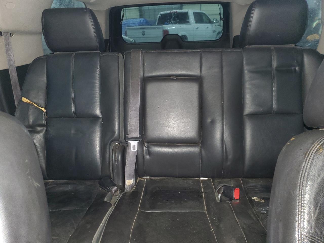 2012 Chevrolet Suburban VIN 1GNSKJE7XCR179086 Copart auction photo, vandalism / hail damage thumbnail 10