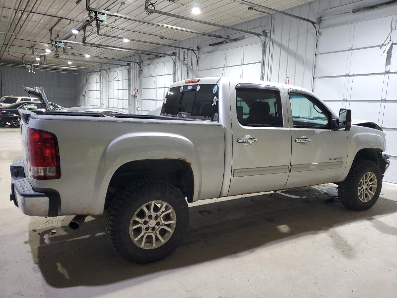 2011 GMC Sierra VIN 3GTP2WE38BG244623 Copart auction photo, all over / front end damage thumbnail 3