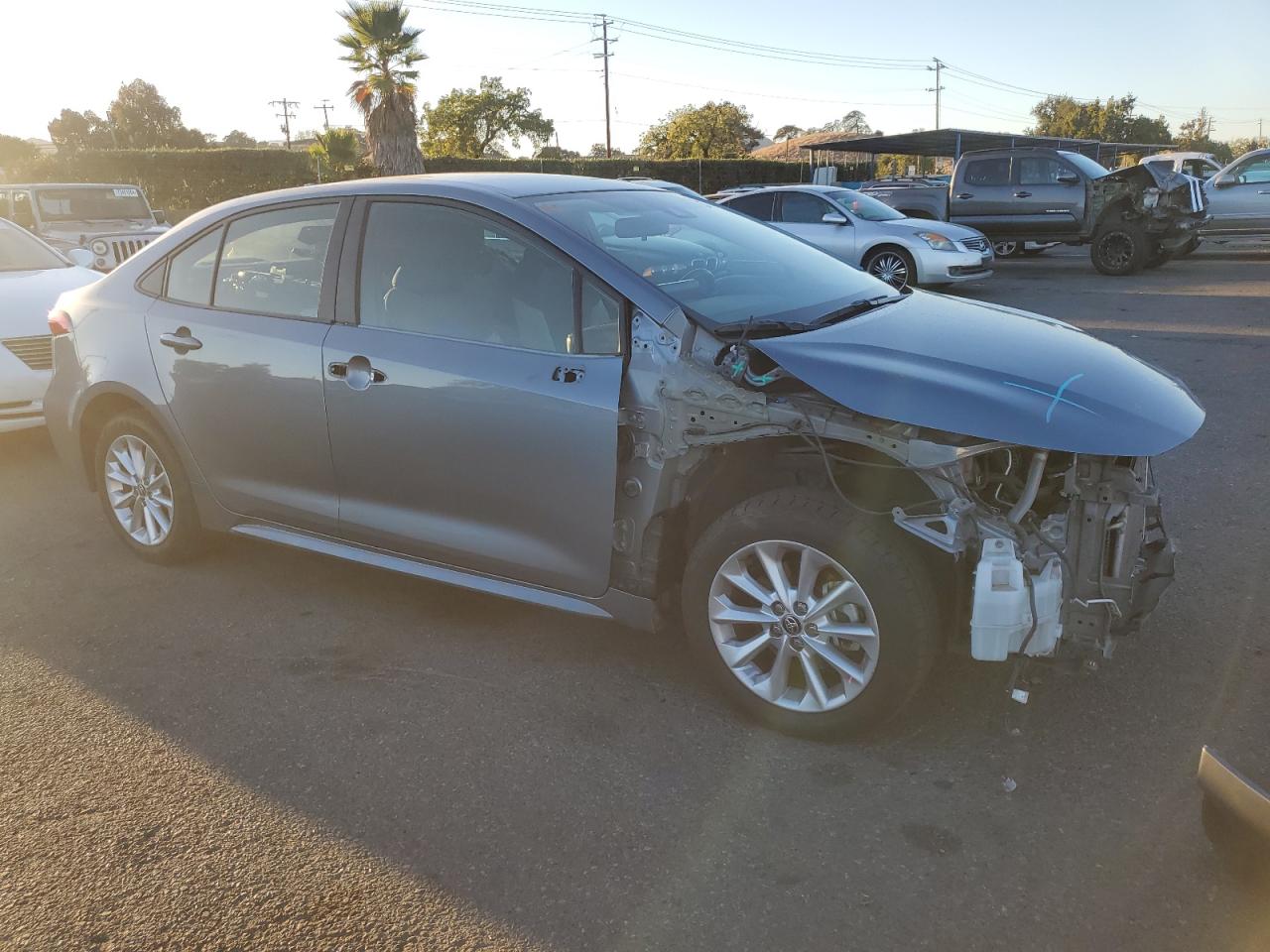 2021 Toyota Corolla VIN JTDVPMAE9MJ151597 Copart auction photo, front end / side damage thumbnail 4