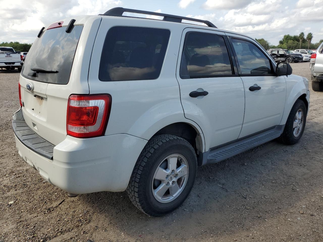2011 Ford Escape VIN 1FMCU0D77BKA92610 Copart auction photo, rear end / front end damage thumbnail 3