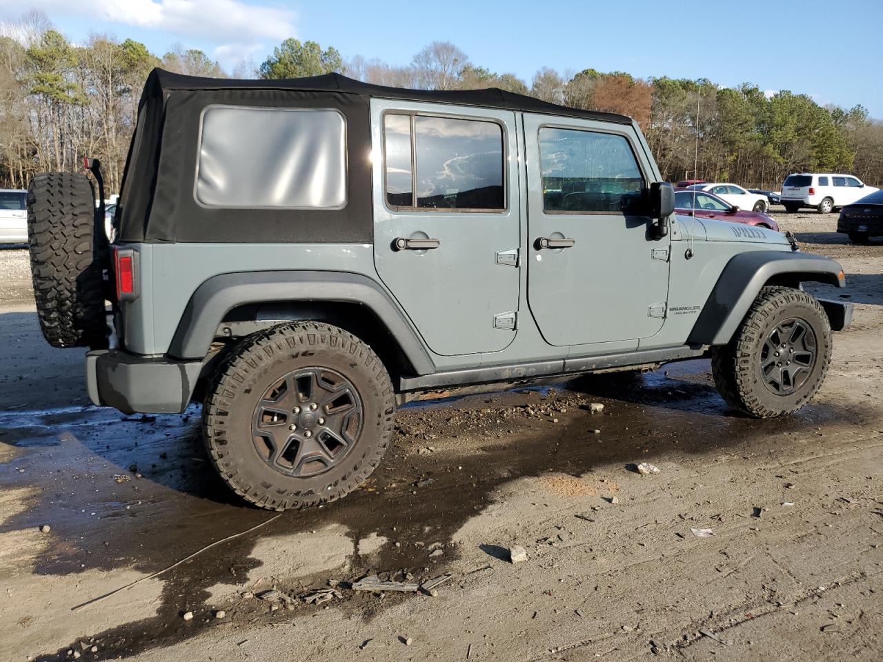 2015 Jeep Wrangler VIN 1C4BJWDG9FL579674 Copart auction photo, side / front end damage thumbnail 3