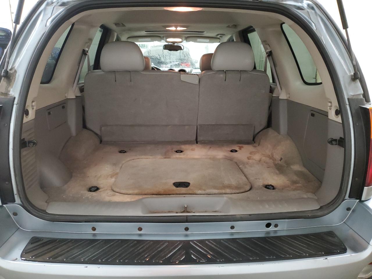 2006 GMC Envoy VIN 1GKDT13S762311826 Copart auction photo, front end / minor dent/scratches damage thumbnail 6