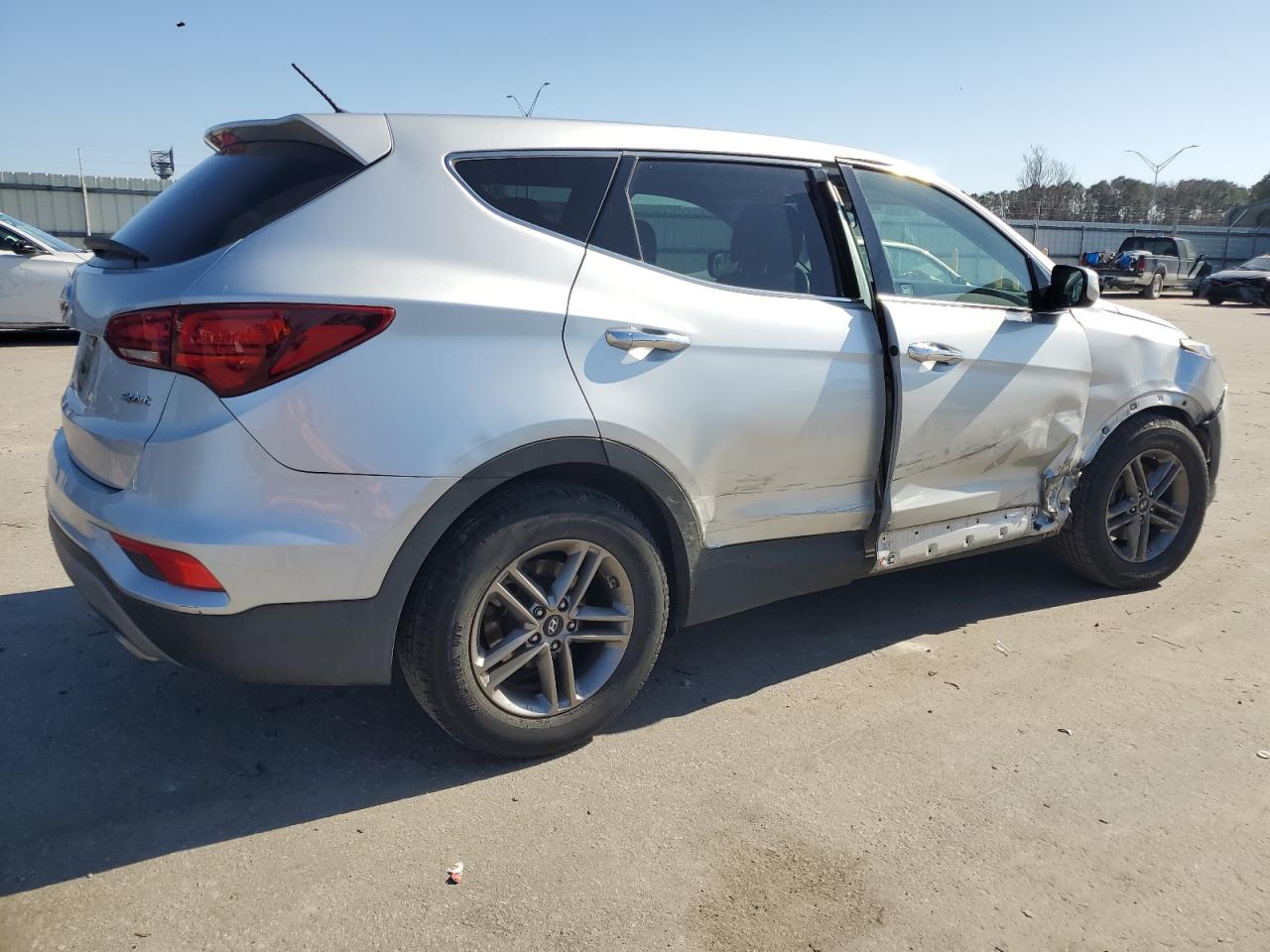 2018 Hyundai Santa Fe VIN 5XYZT3LB1JG562403 Copart auction photo, front end / side damage thumbnail 3