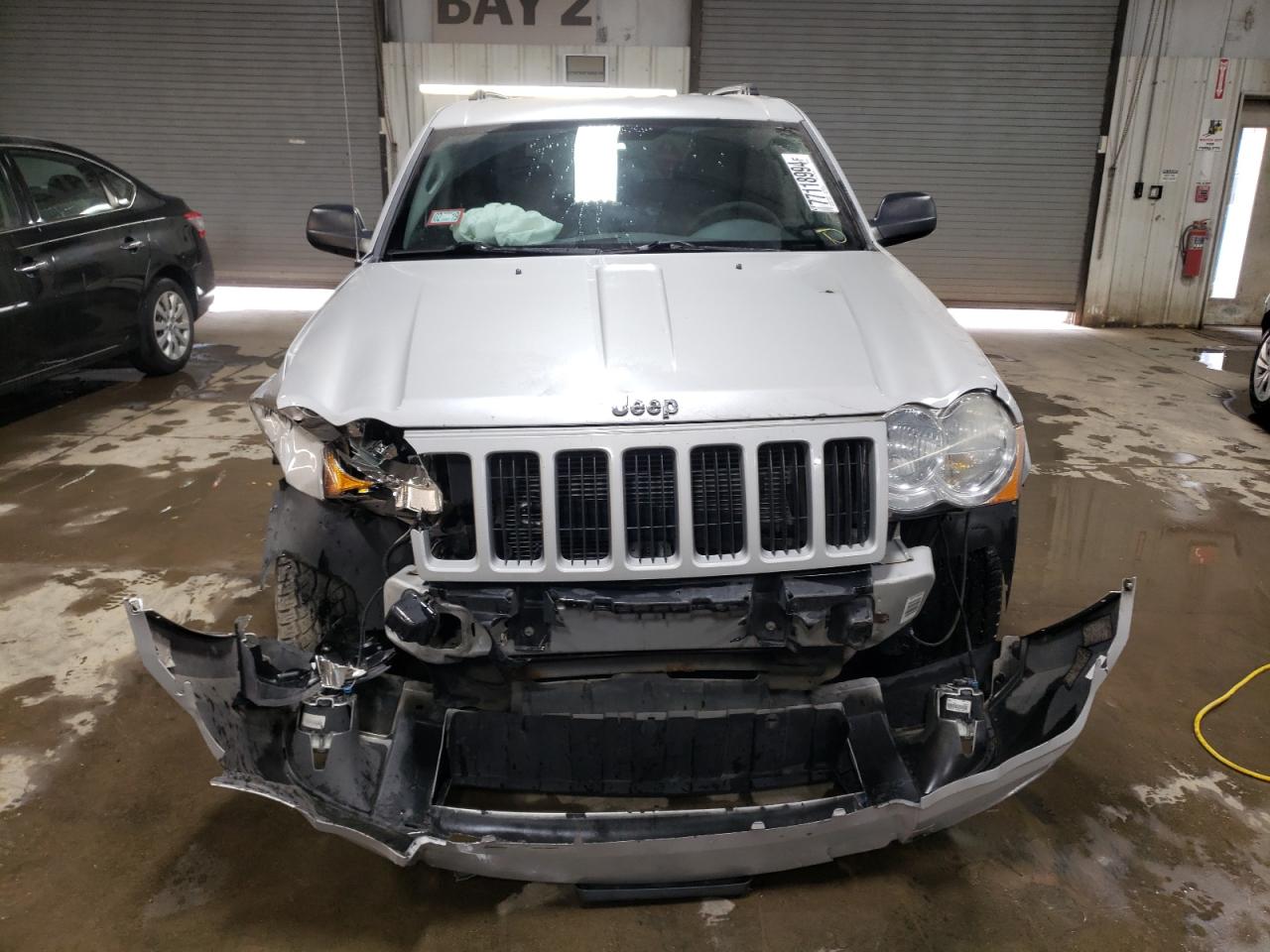 2010 Jeep Grand Cherokee VIN 1J4PR4GK0AC135718 Copart auction photo, front end damage thumbnail 5