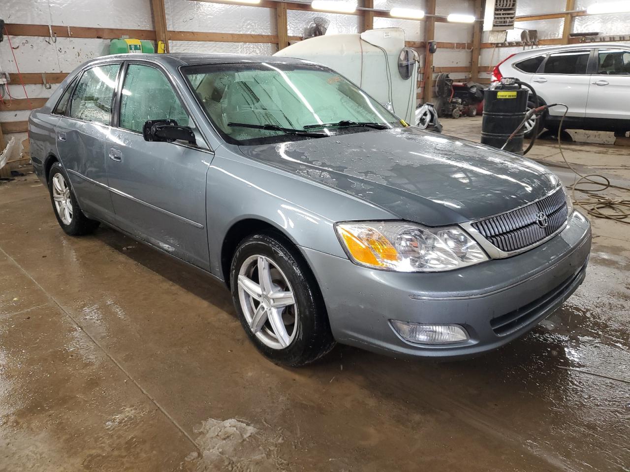 2001 Toyota Avalon VIN 4T1BF28BX1U149367 Copart auction photo, side / rear end damage thumbnail 4