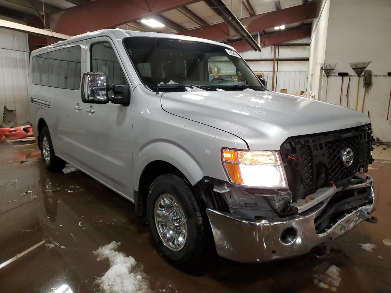 2015 Nissan NV VIN 5BZAF0AA7FN852092 Copart auction photo, front end / side damage thumbnail 4