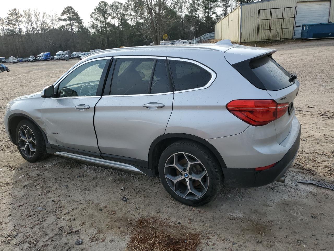 2017 BMW X1 VIN WBXHT3C39H5F85800 Copart auction photo, side / front end damage thumbnail 2