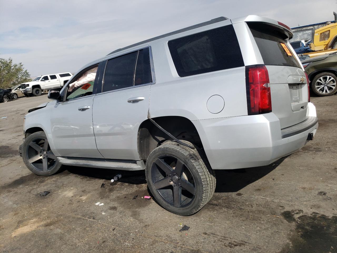 2015 Chevrolet Tahoe VIN 1GNSKBKC0FR272968 Copart auction photo, side / front end damage thumbnail 2