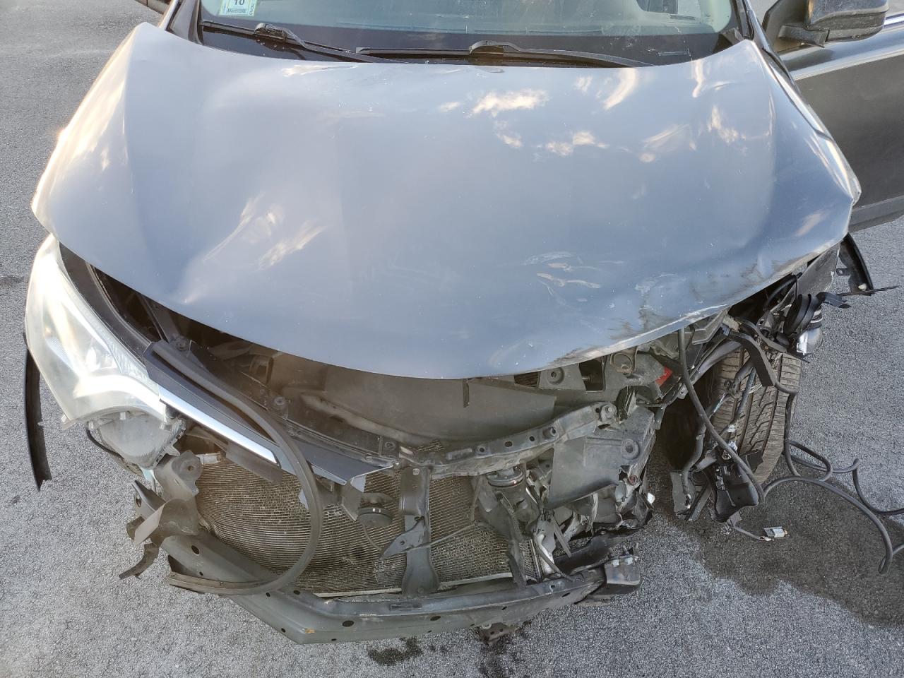 2016 Toyota RAV 4 VIN JTMZFREV3GJ086410 Copart auction photo, front end / minor dent/scratches damage thumbnail 13