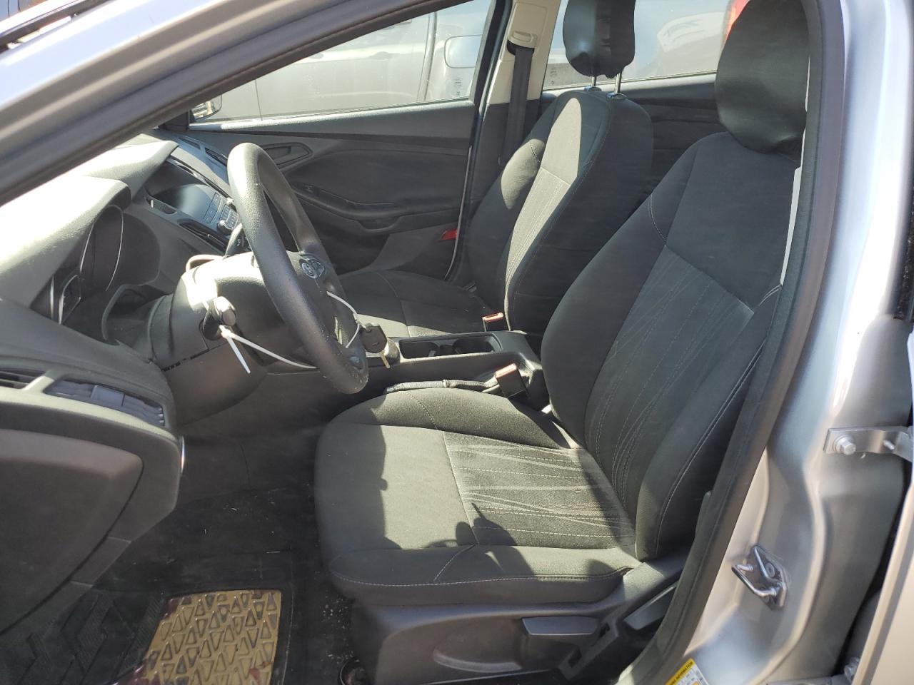 2018 Ford Focus VIN 1FADP3E2XJL320750 Copart auction photo, side / minor dent/scratches damage thumbnail 7