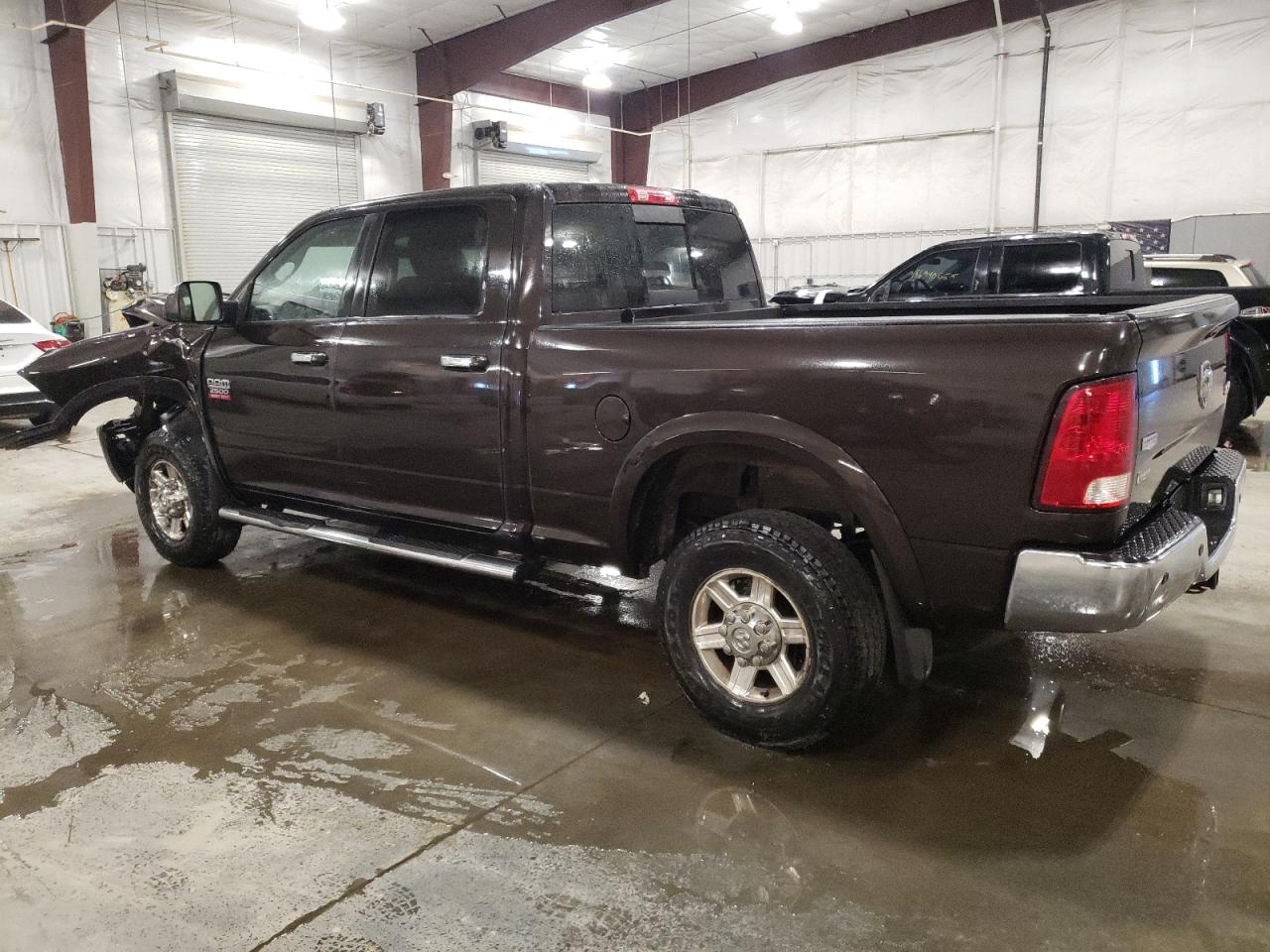 2011 Dodge RAM VIN 3D7TT2CT4BG582856 Copart auction photo, front end / side damage thumbnail 2