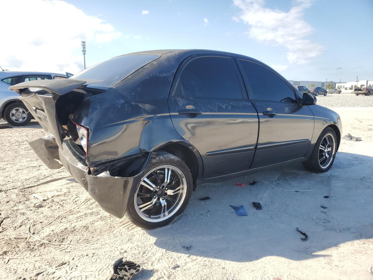 2004 KIA Spectra VIN KNAFE121745055316 Copart auction photo, all over damage thumbnail 3
