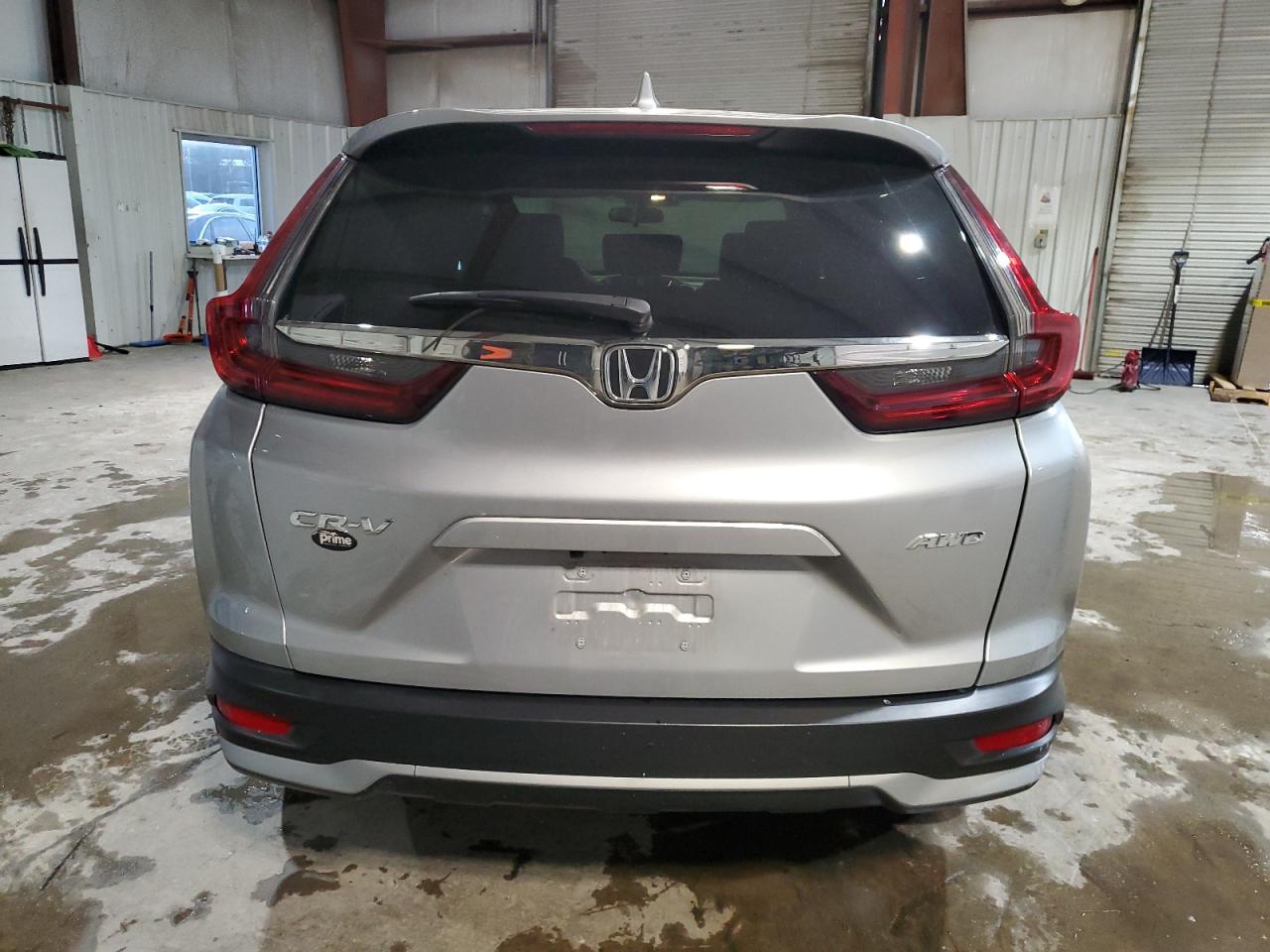 2020 Honda CR-V VIN 2HKRW2H51LH696490 Copart auction photo, undercarriage / minor dent/scratches damage thumbnail 6