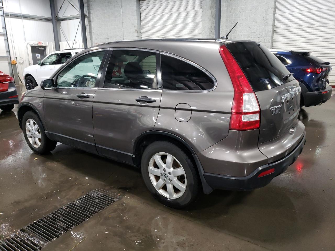2009 Honda CR-V VIN 3CZRE48559G704598 Copart auction photo, front end / undercarriage damage thumbnail 2