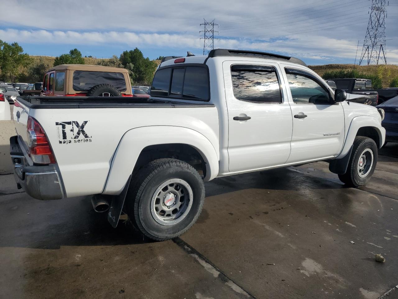 2014 Toyota Tacoma VIN 5TFLU4EN0EX102524 Copart auction photo, front end / side damage thumbnail 3